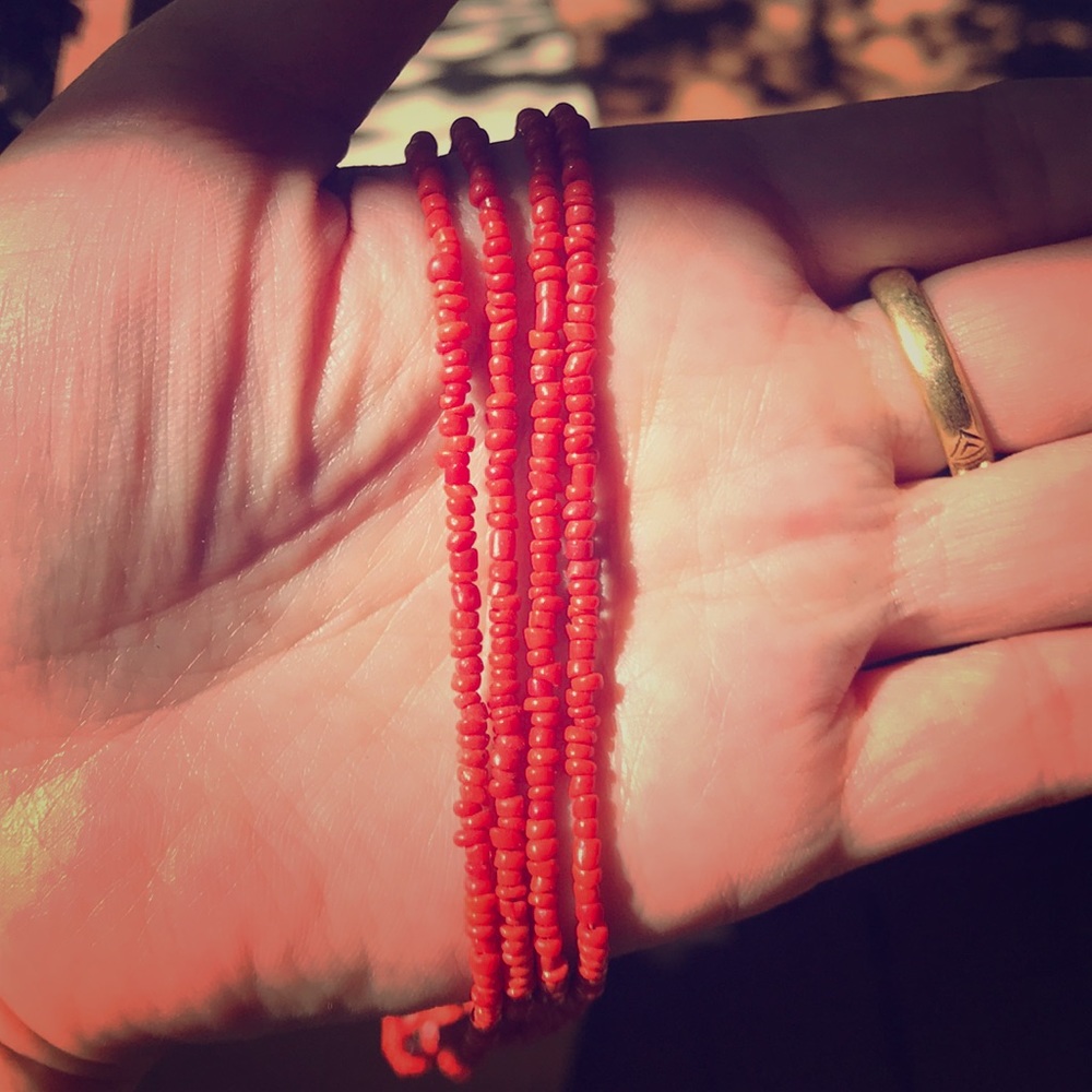 Coral colored multi strand necklace
